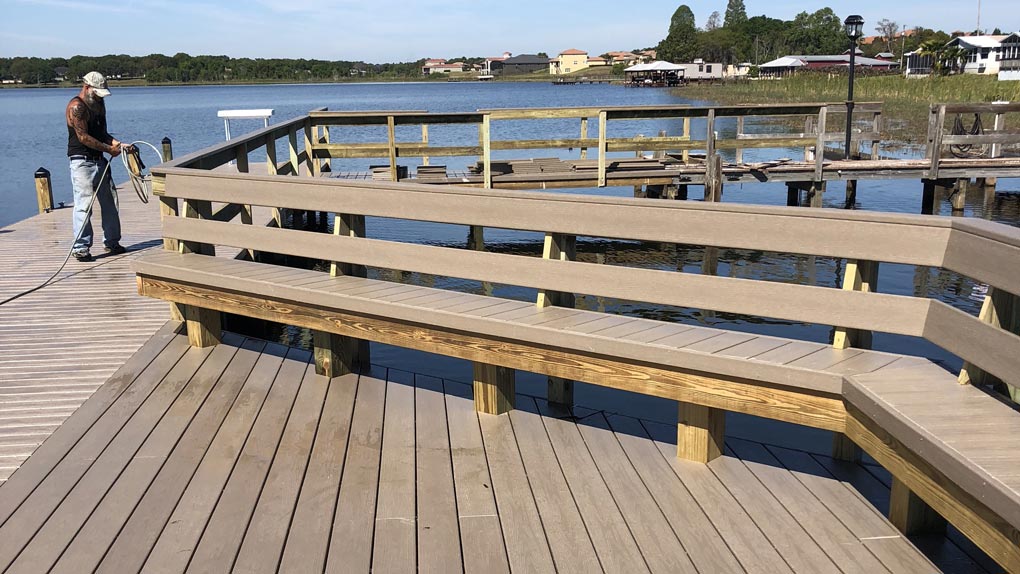 Photo of dock with wood railing and wood seating